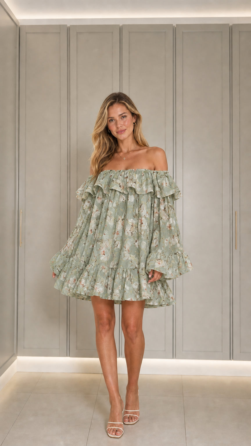Front view of model wearing sage floral mini dress