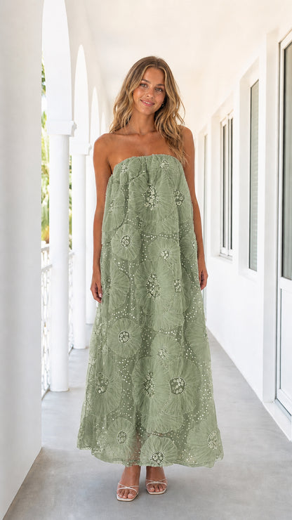 Woman wearing sage green strapless floral mesh maxi dress