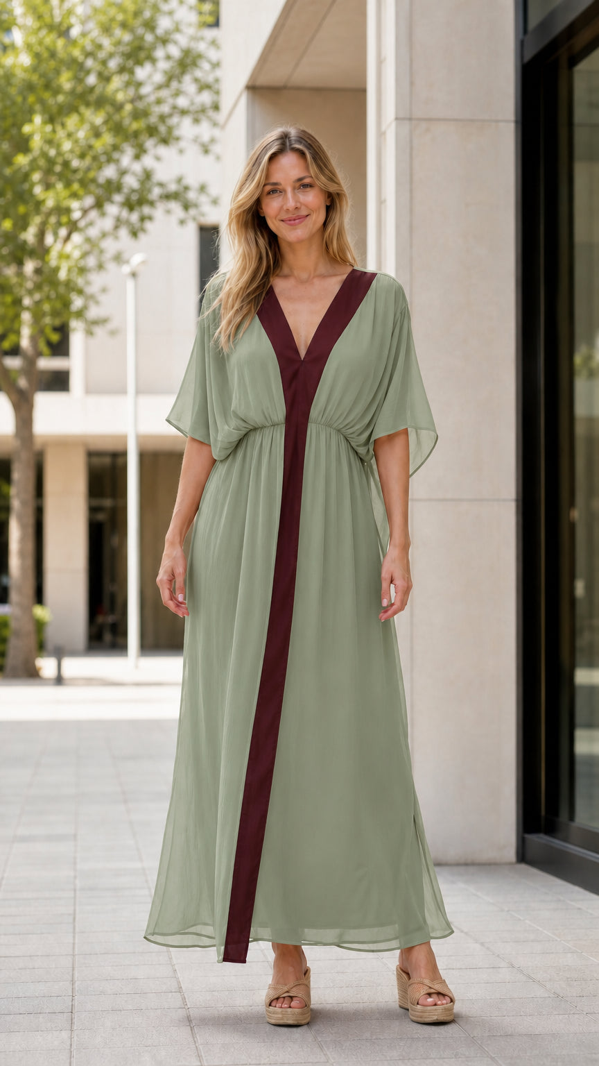 Front view of model wearing sage green maxi kaftan dress