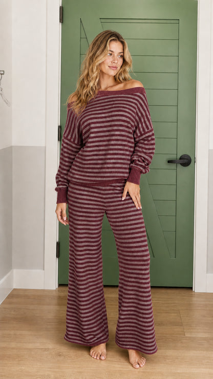 Woman wearing burgundy striped lounge set