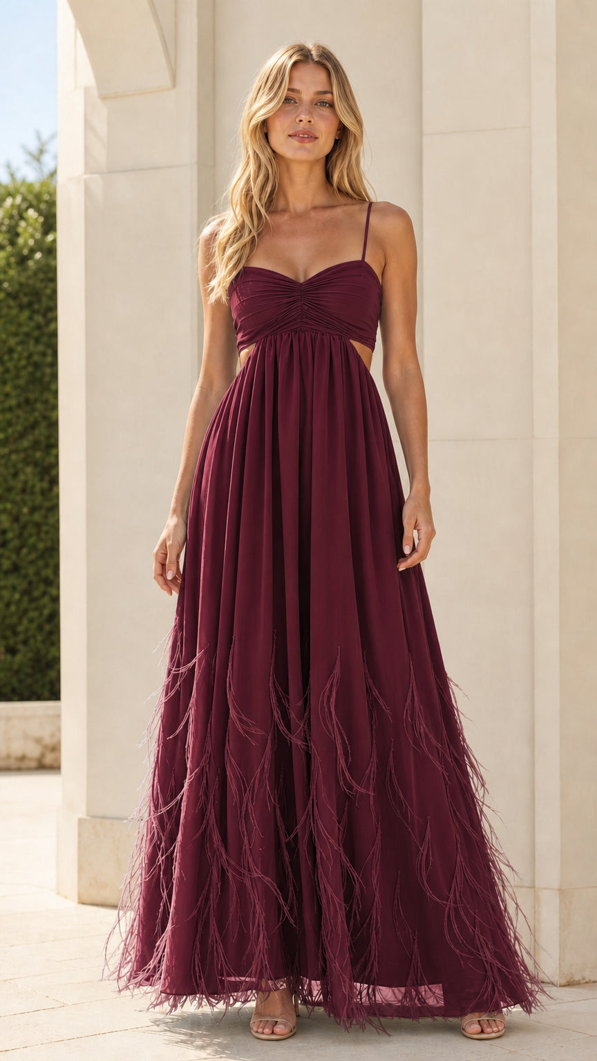 Model wearing burgundy variant of the feather trim maxi dress