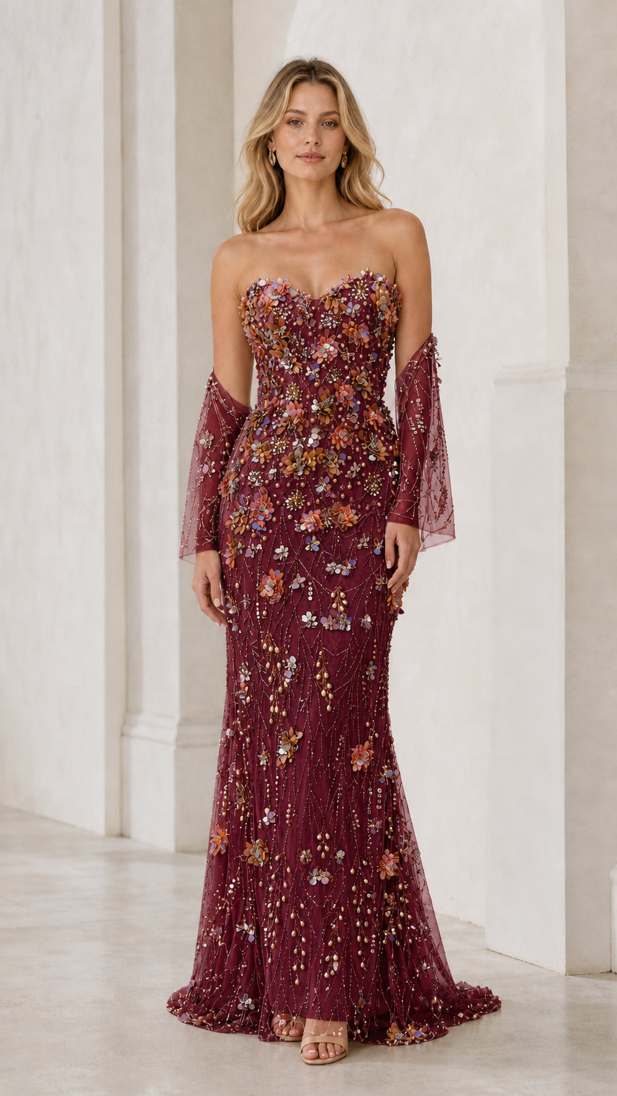 Front view of burgundy evening dress with floral embellishments