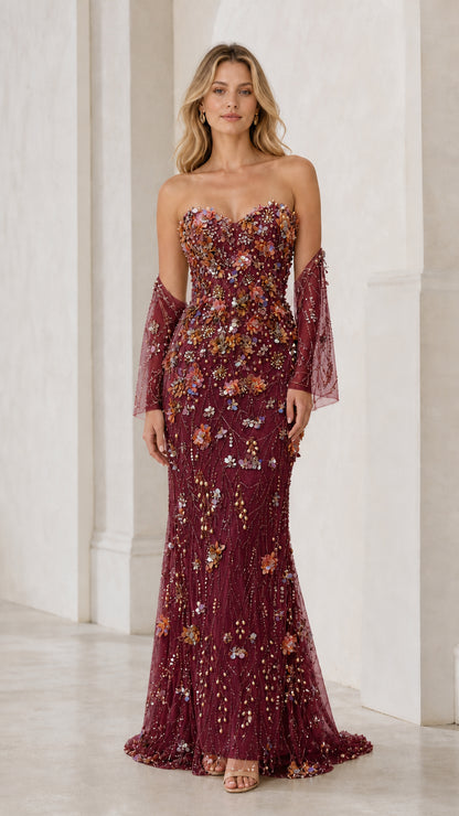 Front view of burgundy evening dress with floral embellishments