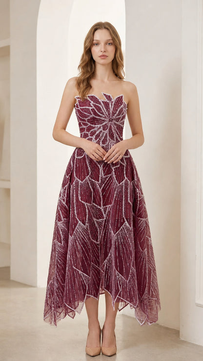 Woman wearing burgundy red strapless beaded leaf embroidery midi cocktail dress