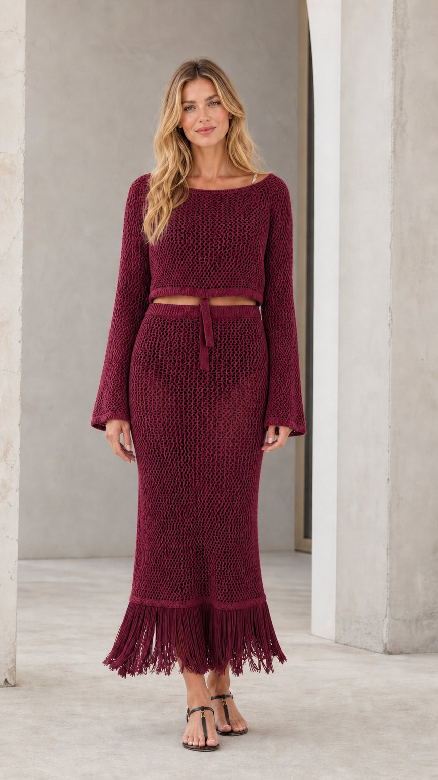 Front view of model wearing burgundy crochet two-piece set