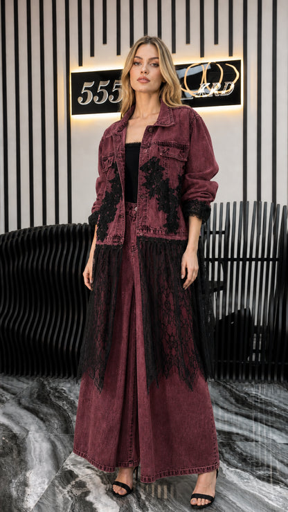 Front view of model wearing burgundy denim long jacket and matching pants with lace trim