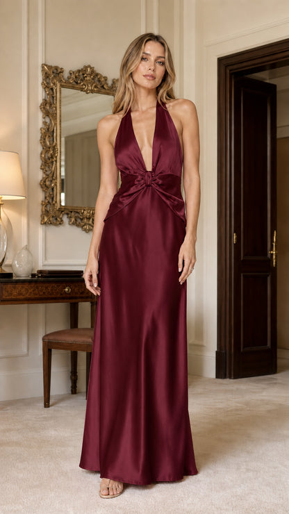 Front view of model wearing burgundy satin evening dress