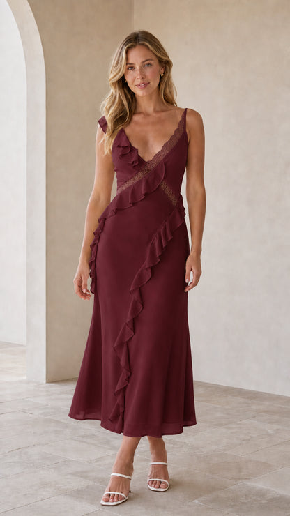 Model wearing burgundy ruffled lace-trim slip midi dress
