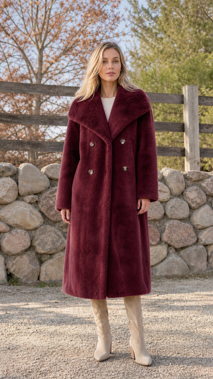 Woman wearing burgundy faux fur long coat