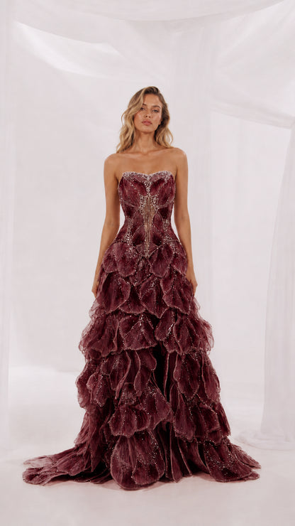 Front view of burgundy strapless evening gown