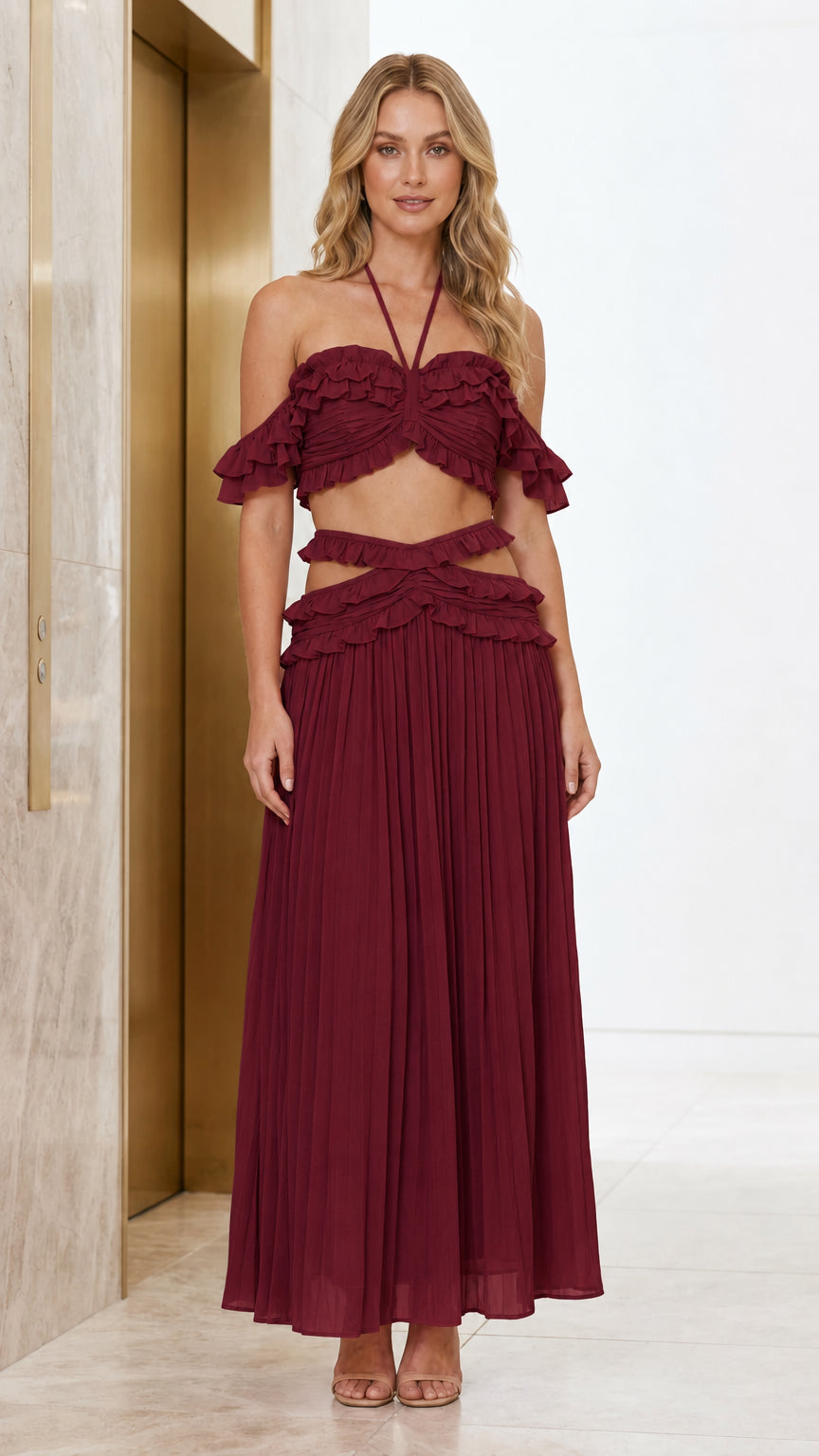 Front view of model wearing burgundy color variant