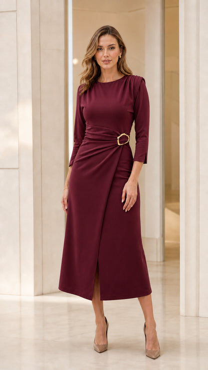Model wearing burgundy wine 3/4 sleeve gathered waist midi dress with gold buckle