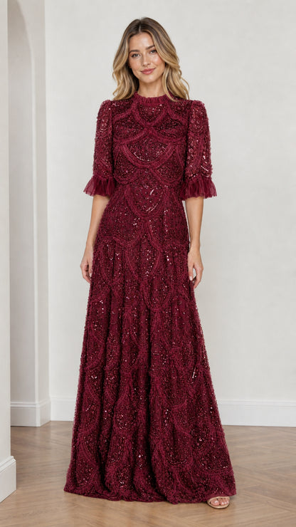 Model wearing Burgundy embellished ruffle mock neck maxi dress, front view