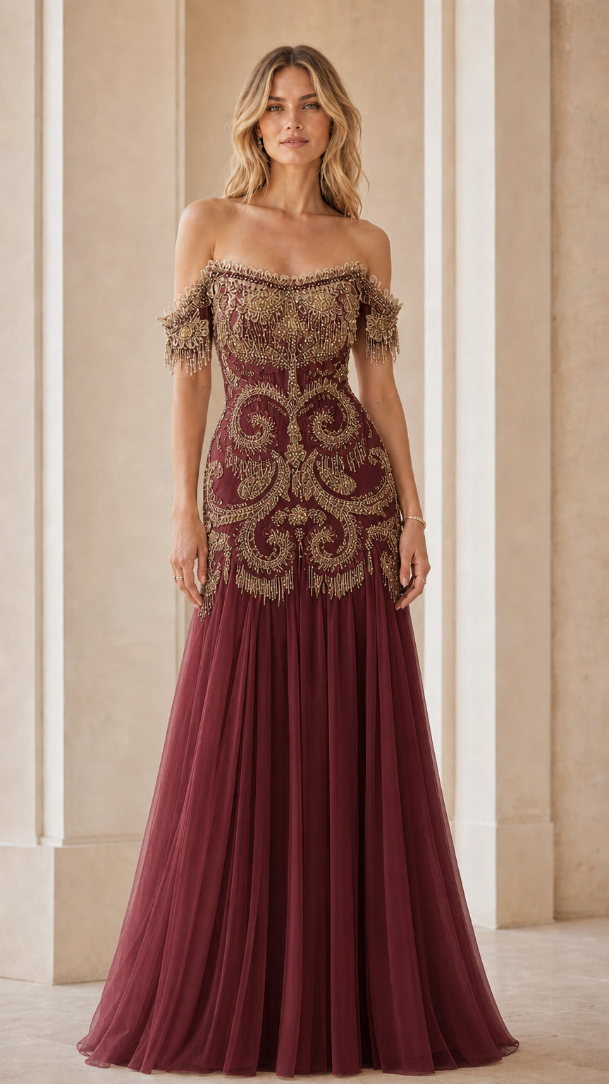 Front view of burgundy evening gown with gold beading