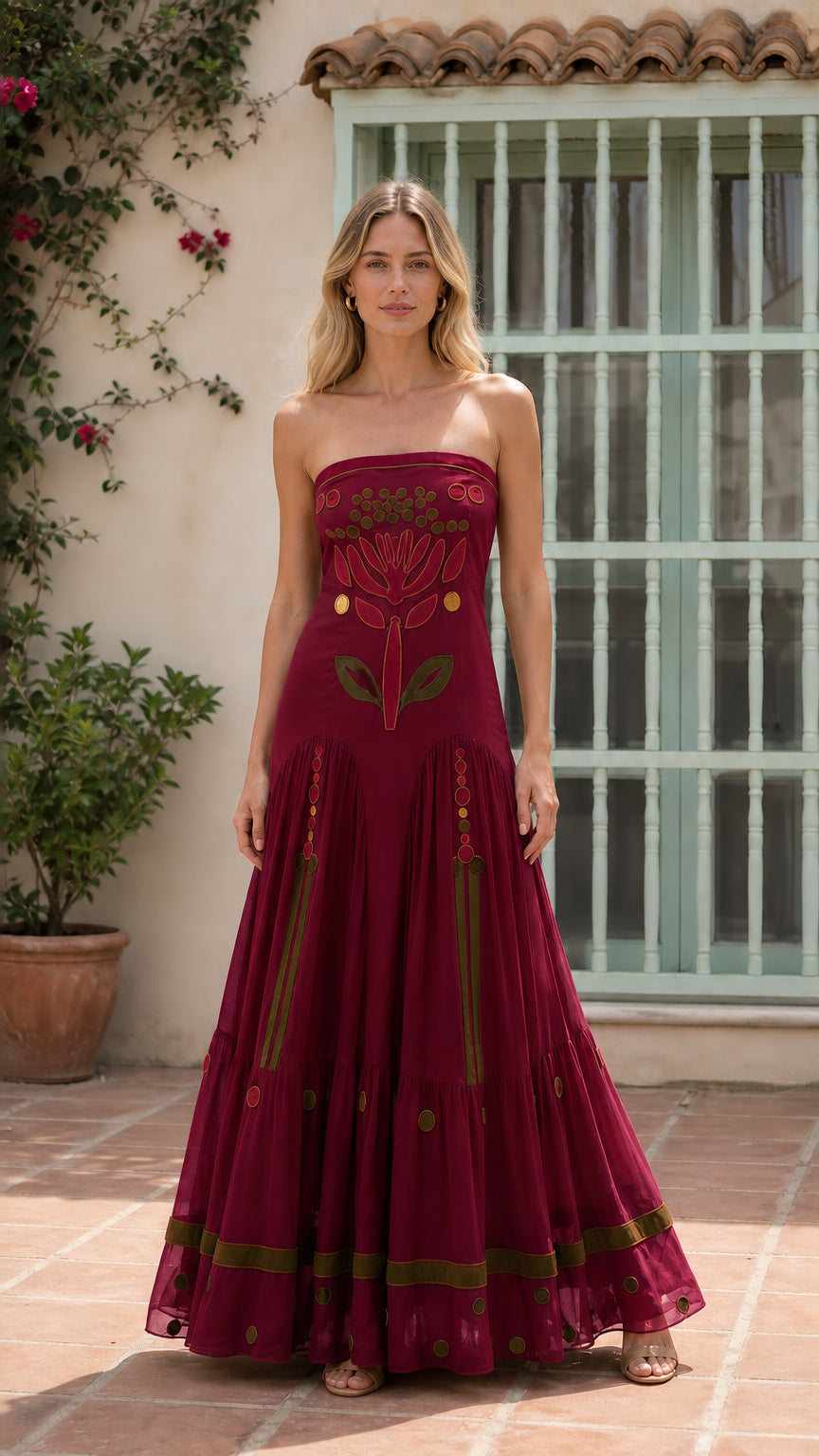 Front view of burgundy strapless embroidered maxi dress