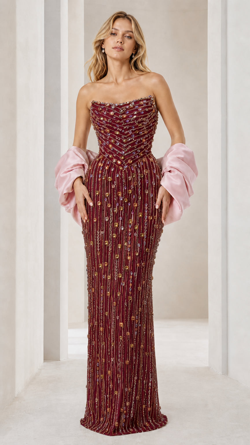 Front view of burgundy beaded evening gown