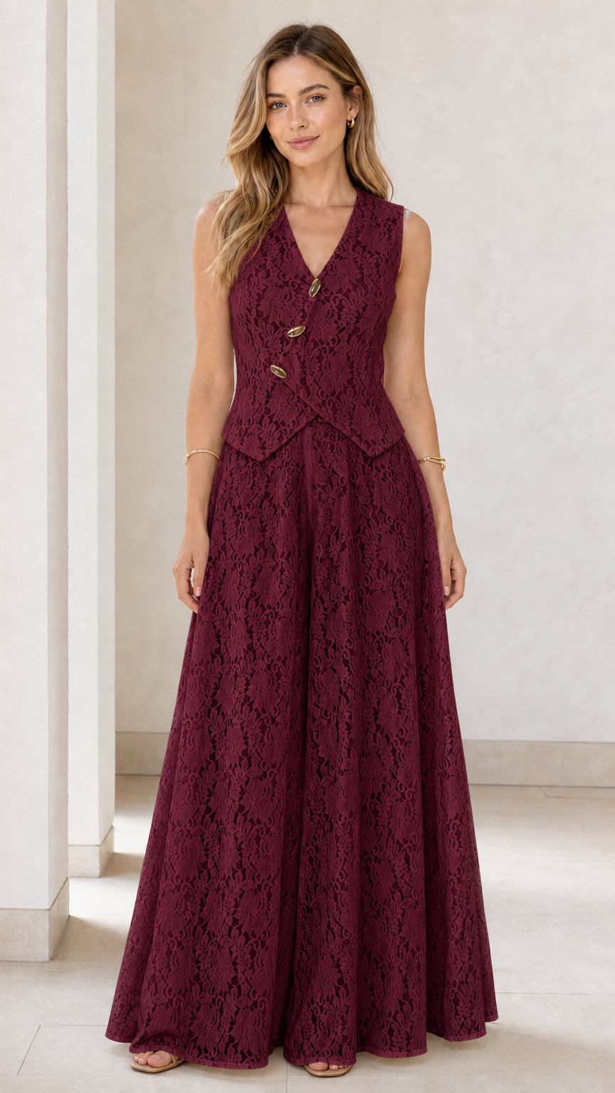 Model wearing burgundy lace vest and wide leg jumpsuit