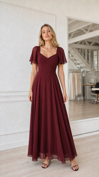Full length view of burgundy evening gown