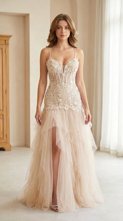 Front view of model wearing champagne beige lace corset tulle maxi dress