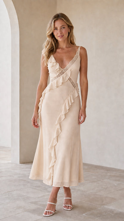 Model wearing champagne ruffled lace-trim slip midi dress