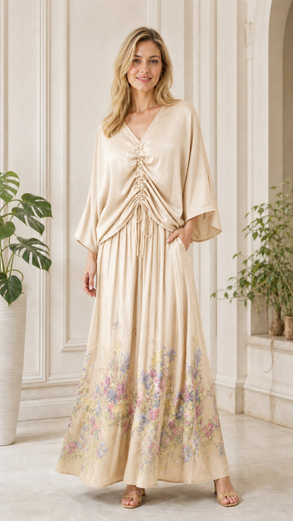 Front view of champagne color variant maxi dress