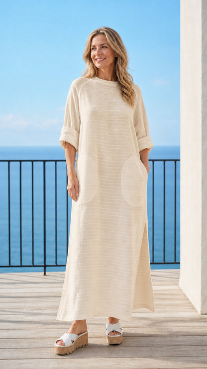 Woman wearing beige long sleeve maxi dress
