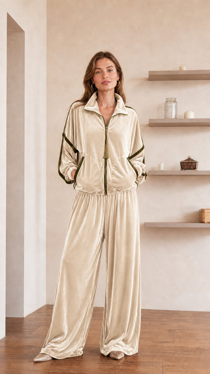 Model wearing cream velvet tracksuit set