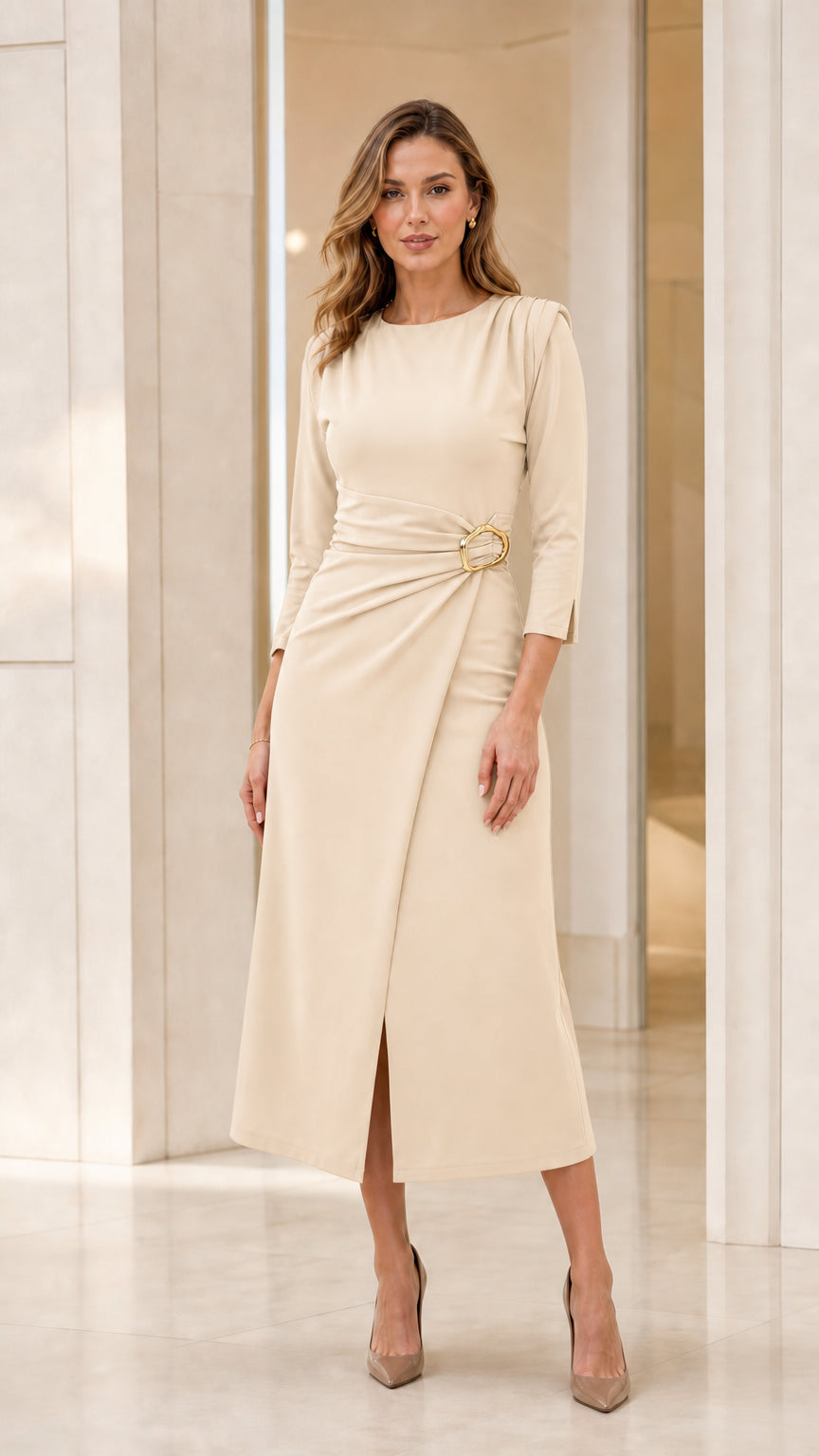 Model wearing cream off-white 3/4 sleeve gathered waist midi dress with gold buckle
