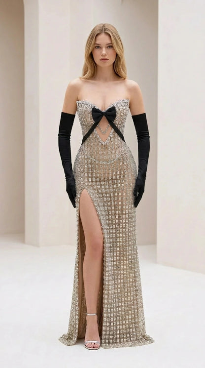 Front view of champagne crystal embellished strapless evening gown
