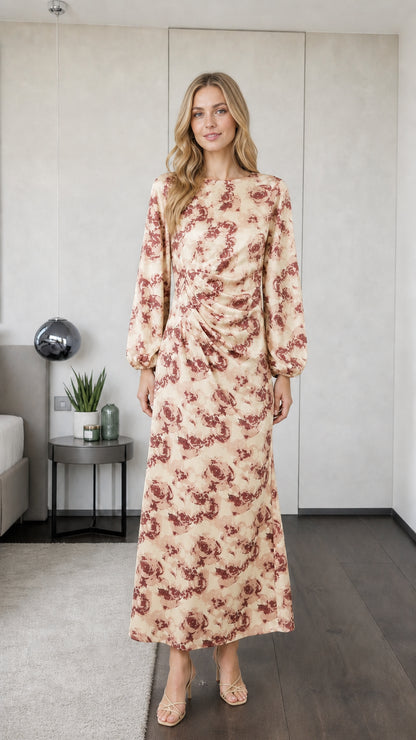 Model wearing champagne floral long sleeve maxi dress
