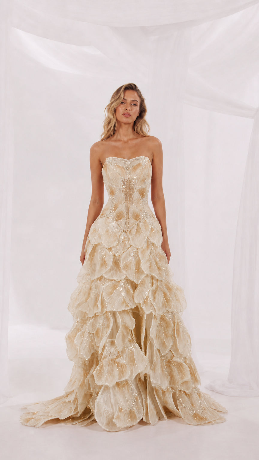 Front view of champagne strapless evening gown