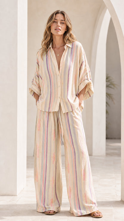 Model wearing beige multi striped lounge set