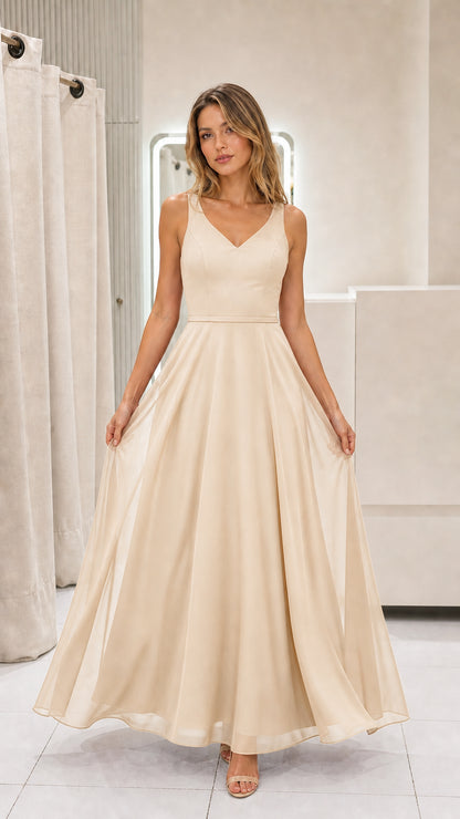 Model wearing champagne chiffon maxi dress