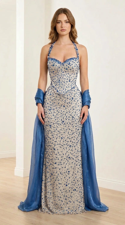 Front view of champagne embellished halter evening gown
